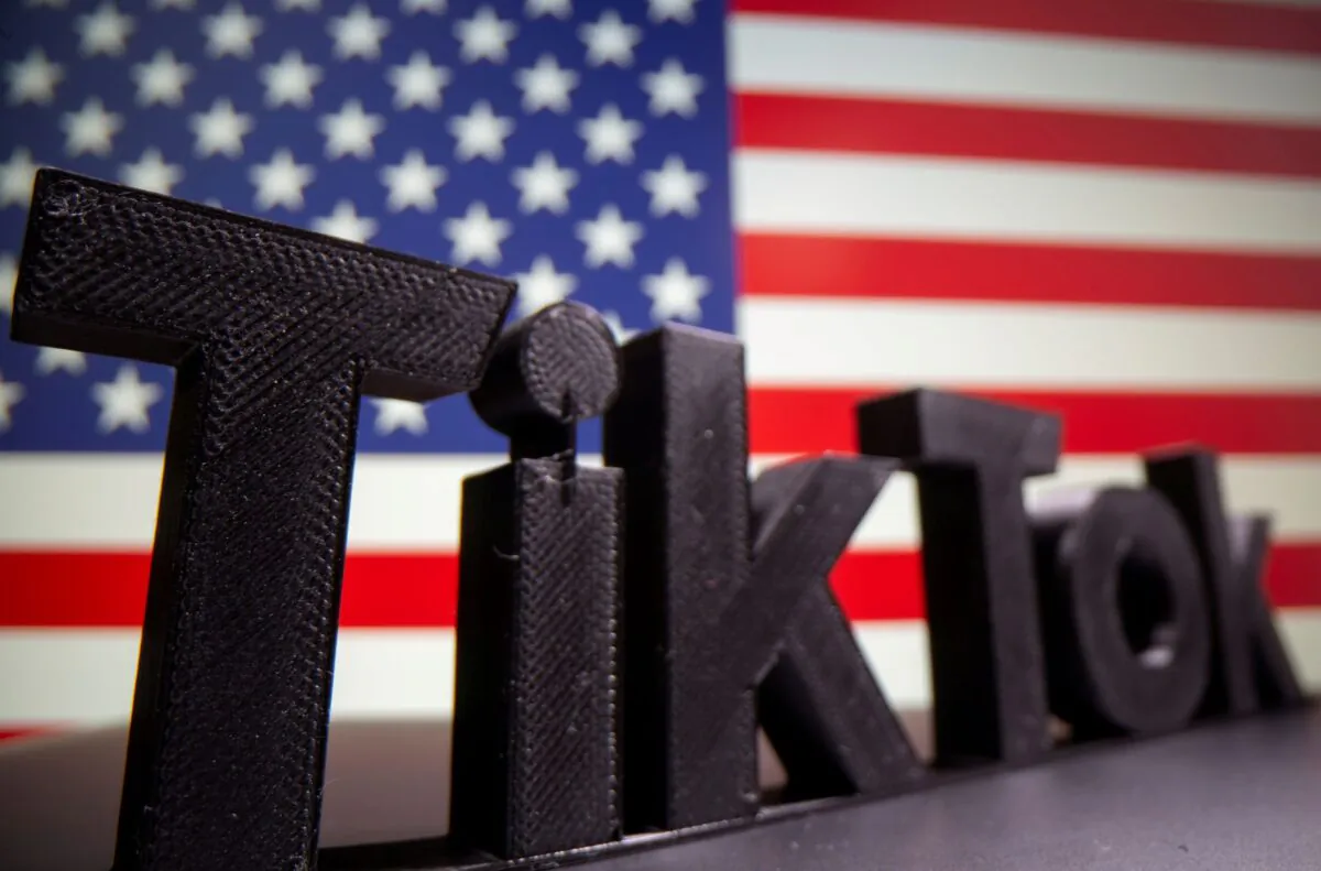 A 3D printed Tik Tok logo is seen in front of a U.S. flag in this illustration taken on Oct. 6, 2020. (Dado Ruvic/Illustration/Reuters File Photo)