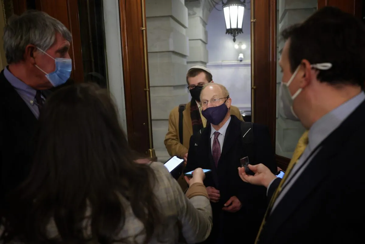 David Schoen, attorney for former President Donald Trump in the impeachment trial, speaks to reporters while leaving the Capitol in Washington on Feb. 9, 2021. (Win McNamee/Getty Images)