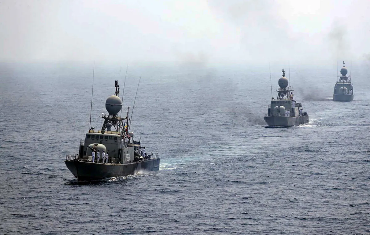 Iranian naval ships parade during the last day of a military exercise in the Gulf, near the strategic Strait of Hormuz in southern Iran, in September 2020. (Iranian Army office/AFP via Getty Images)