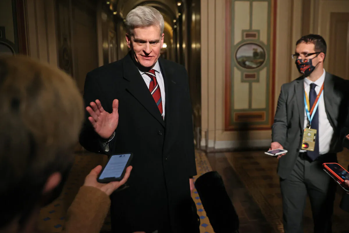 Sen. Bill Cassidy (R-La.) speaks to reporters in Washington on Feb. 9, 2021. (Chip Somodevilla/Pool/AFP via Getty Images)