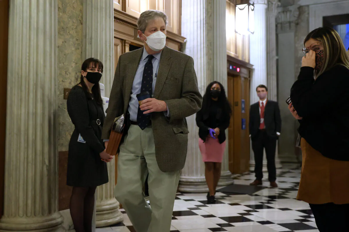 Sen. John Kennedy (R-La.) walks in Washington, on Feb. 8, 2021. (Chip Somodevilla/Getty Images)