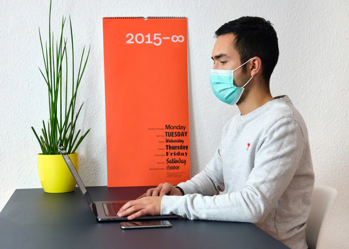 A person working remotely during the COVID-19 pandemic in a file photo. (Daniel Foster/Flickr)