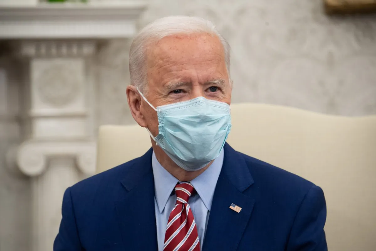 President Joe Biden holds a meeting with senators about infrastructure improvements in the Oval Office of the White House in Washington on Feb. 11, 2021. (Saul Loeb/AFP via Getty Images)