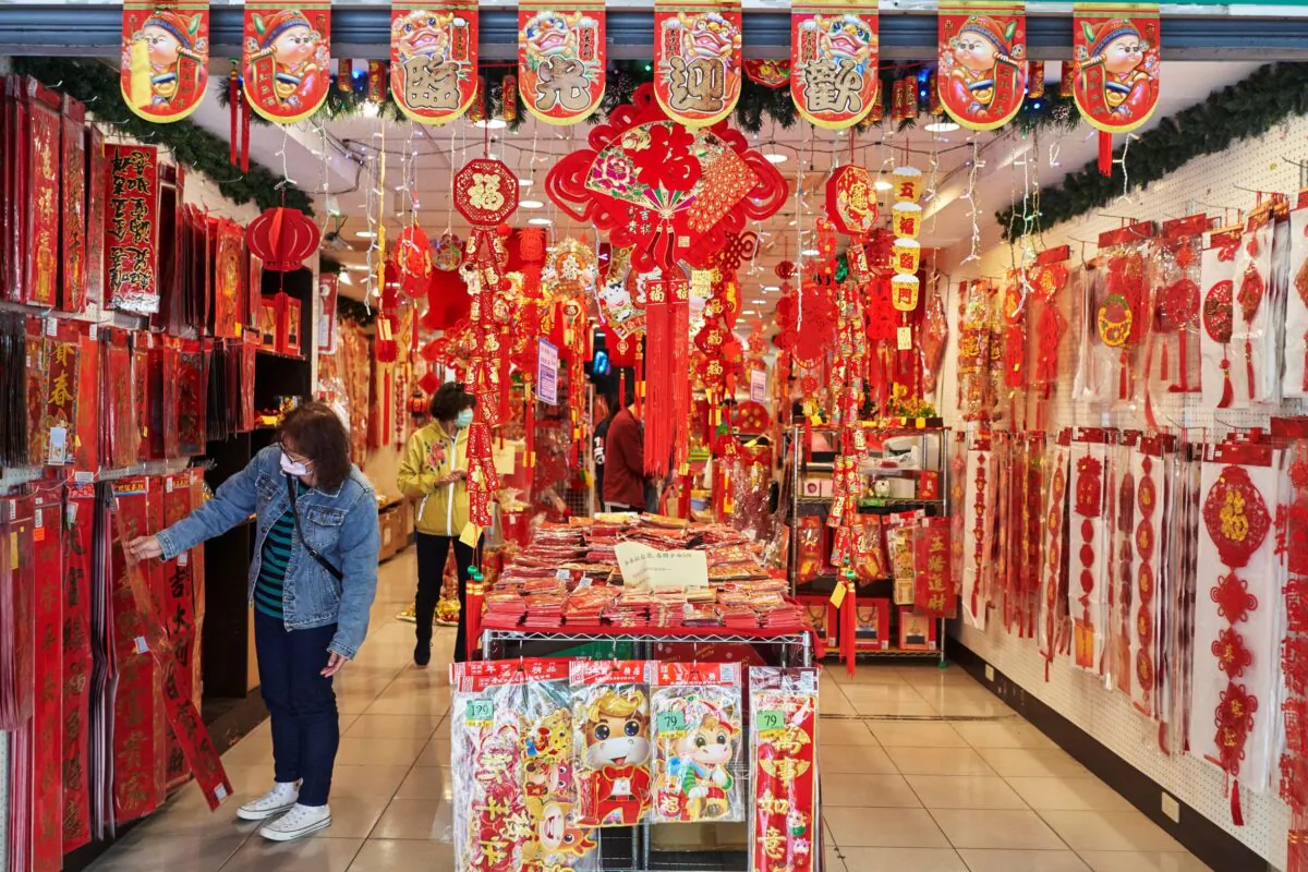 Shoppers look for decorations to buy as people prepare for Chinese New Year at Dihua Street in Taipei, Taiwan on Feb. 10, 2021. (An Rong Xu/Getty Images)