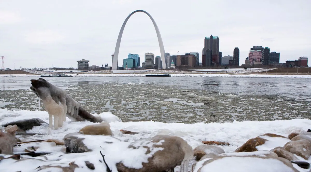 The Gateway Arch is seen across from snow covered banks of the Mississippi River during cold weather in St Louis, Mo., on Feb. 11, 2021. (Lawrence Bryant/Reuters)