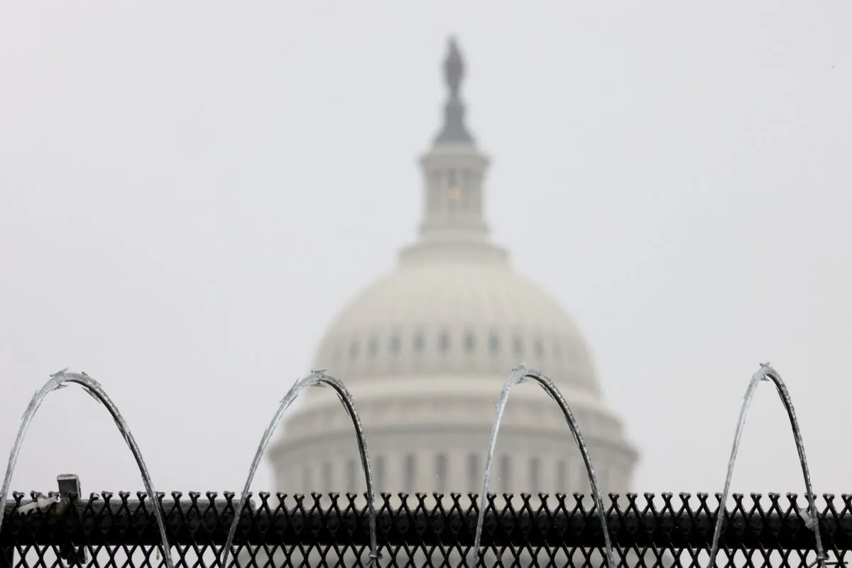 Razor wire is shown atop a fence outside the Capitol in Washington during the fifth day of former President Donald Trump's impeachment trial on Feb. 13, 2021. (Win McNamee/Getty Images)