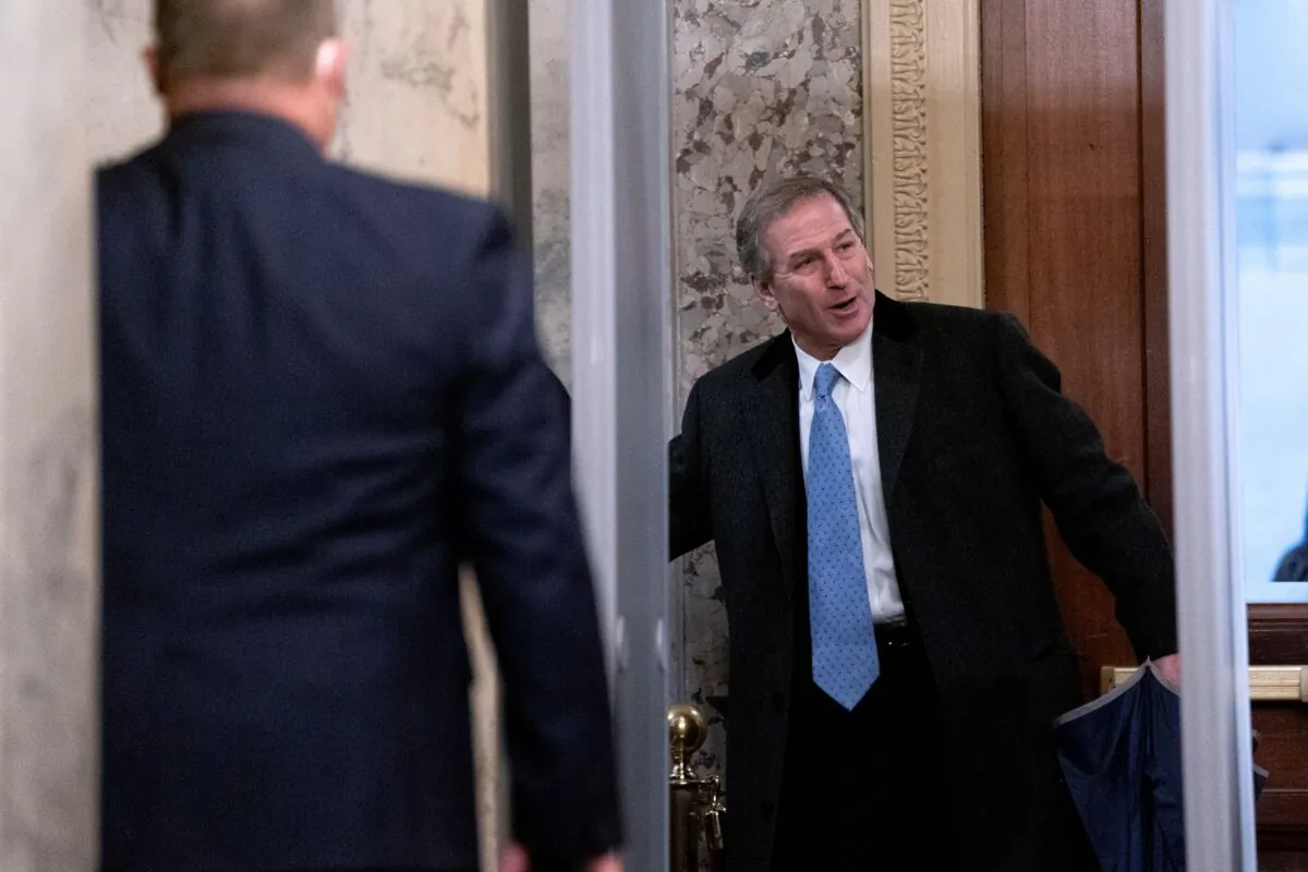 Michael van der Veen (R), defense attorney for Donald Trump, arrives before the fifth day of the Senate Impeachment trials for former President Donald Trump on Capitol Hill in Washington, on Feb. 13, 2021. (Stefani Reynolds/Getty Images)