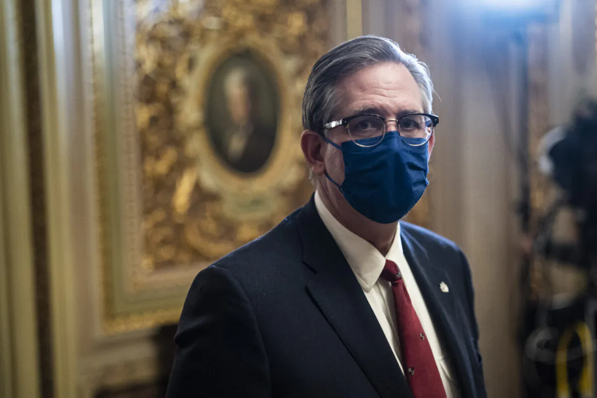 Bruce Castor, former President Donald Trump's defense lawyer, walks from the Senate floor through the Senate Reception room on the fourth day of the second impeachment trial of Trump at the U.S. Capitol in Washington on Feb. 12, 2021. (Jabin Botsford/Getty Images)