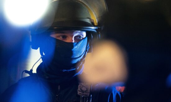 Antifa Activists Smash Windows, Chuck Snowballs at Police in Portland