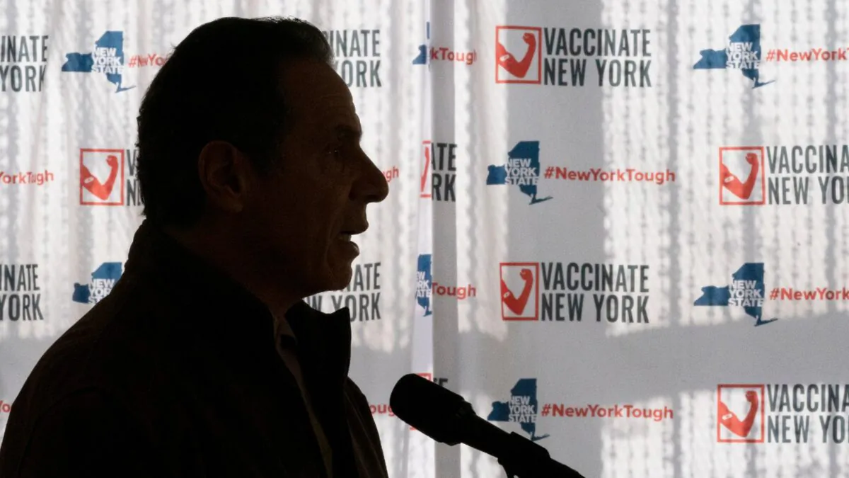Gov. Andrew Cuomo speaks to reporters during a news conference at a COVID-19 pop-up vaccination site in the William Reid Apartments in the Brooklyn borough of New York on Jan,. 23, 2021. (Mary Altaffer/Pool/AP)