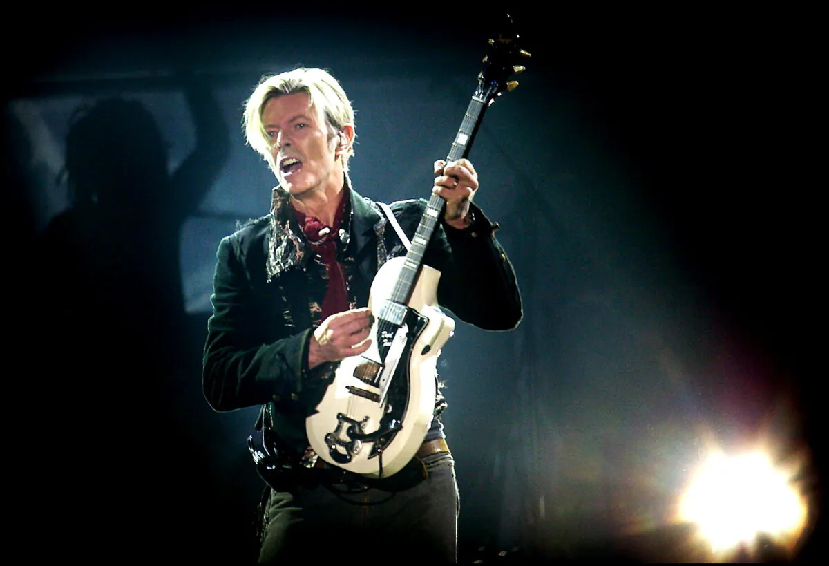 Rock legend David Bowie performs on stage at the Forum in Copenhagen on Oct. 7, 2003. (Nils Meilvang/AFP via Getty Images)