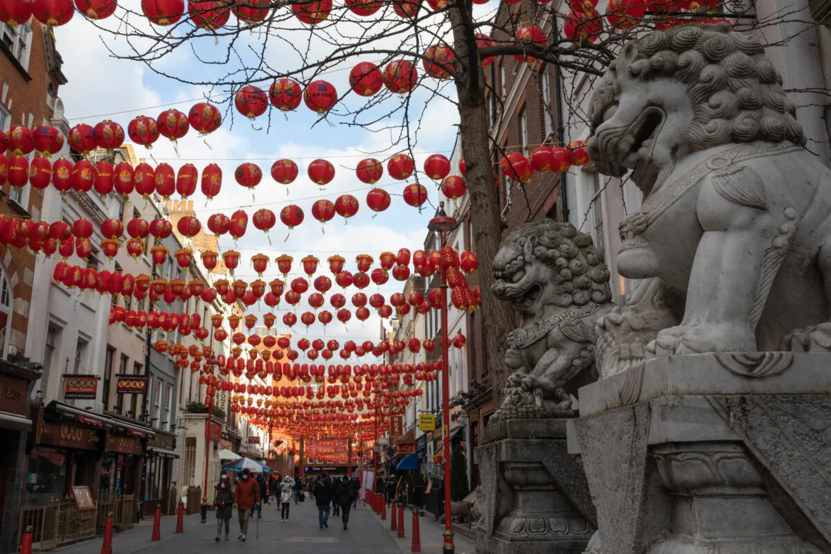 People walk through the Chinatown neighborhood in London, on Feb. 12, 2021. (Dan Kitwood/Getty Images)
