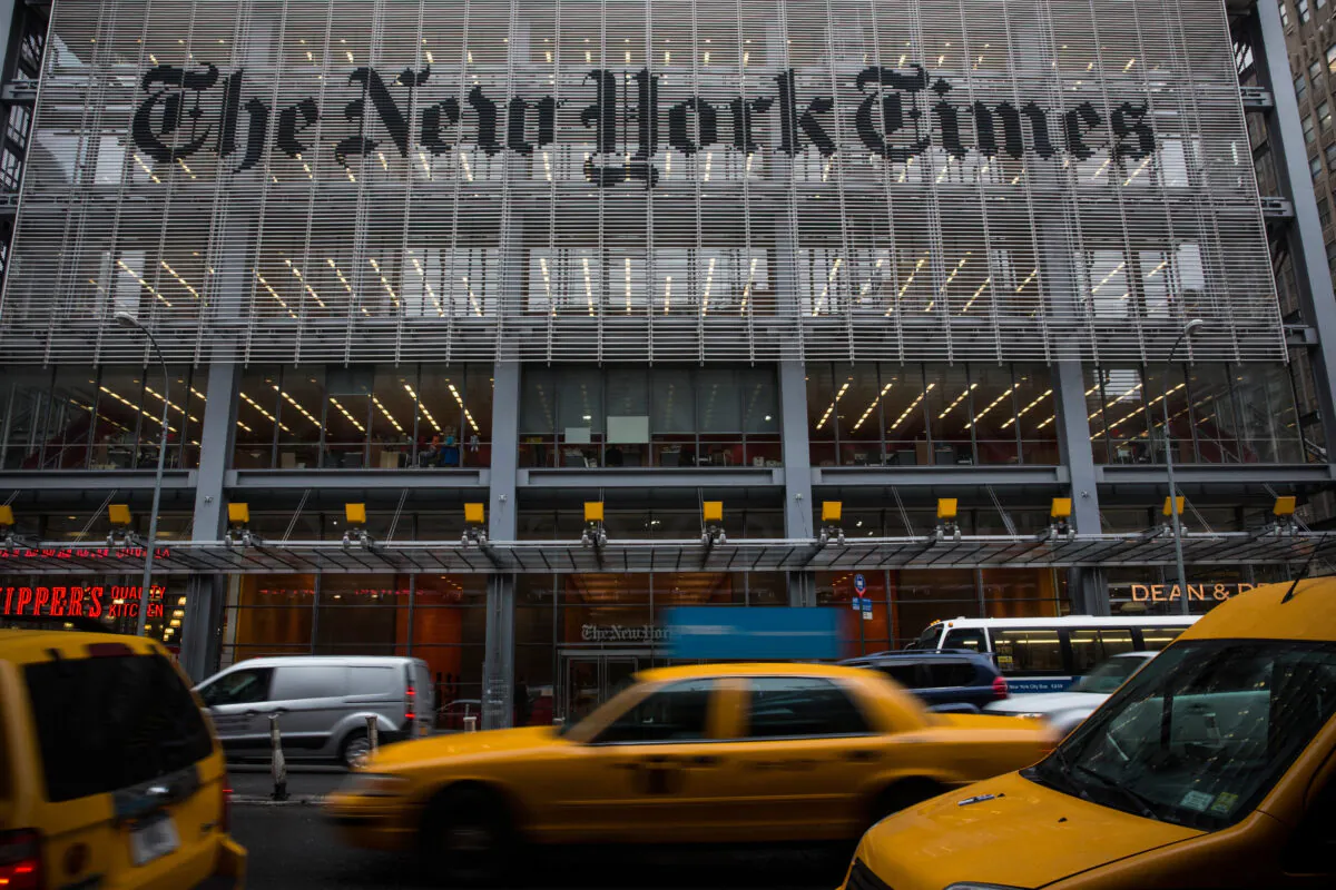 Traffic drives past The New York Times building in New York City on Oct. 1, 2014. (Andrew Burton/Getty Images)