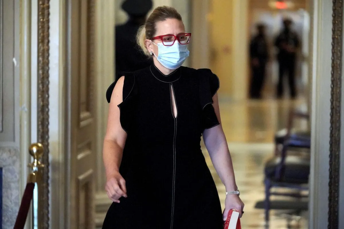 U.S. Senator Kyrsten Sinema at the U.S. Capitol in Washington, on Feb. 13, 2021. (GREG NASH/POOL/AFP via Getty Images)
