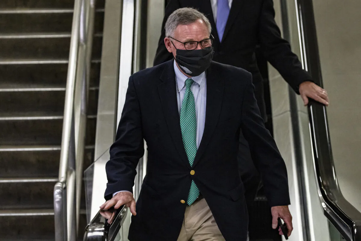 Sen. Richard Burr (R-N.C.) walks through the Senate subway after calling former President Donald Trump guilty of inciting an insurrection, in Washington on Feb. 13, 2021. (Samuel Corum/Getty Images)