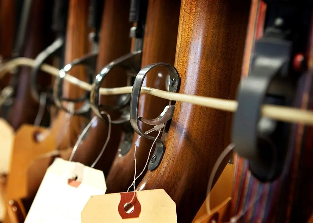 Rifles are shown locked up in Calgary, on Sept. 15, 2010. (The Canadian Press/Jeff McIntosh)