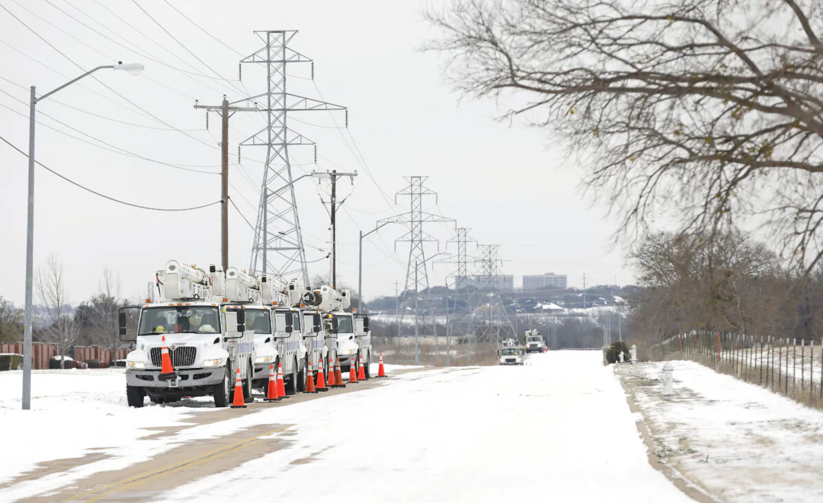 Pike Electric service trucks line up after a snowstorm in Fort Worth, Texas, on Feb. 16, 2021. (Ron Jenkins/Getty Images)