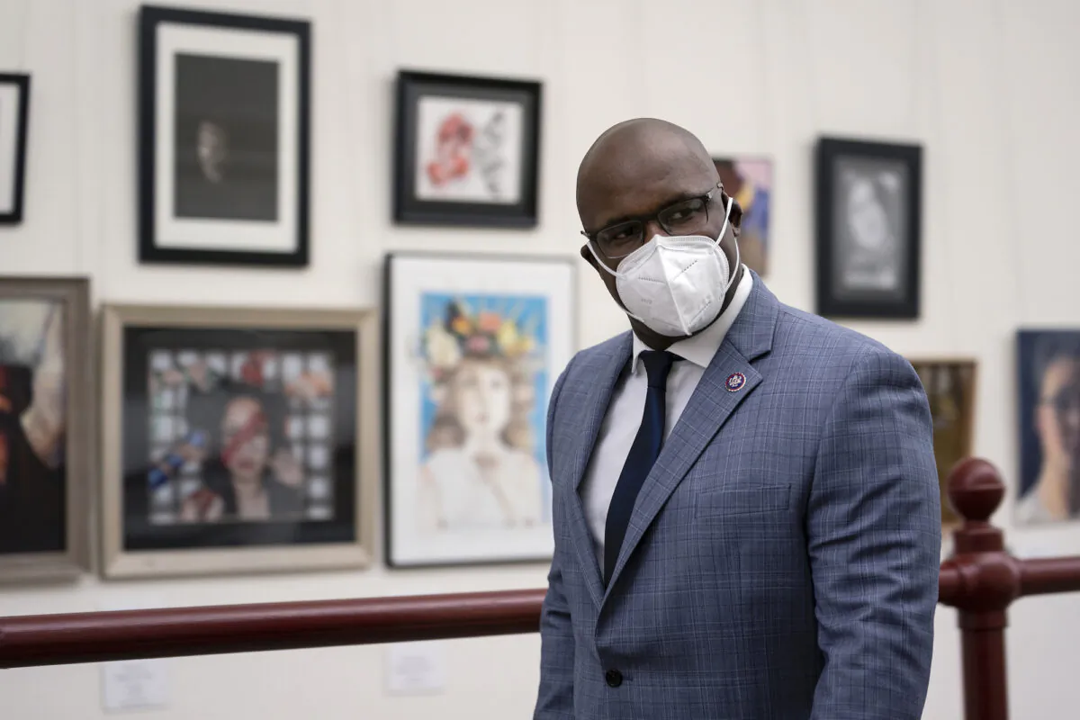 Rep. Jamaal Bowman (D-N.Y.) wears a mask as he walks through the Canon Tunnel to the U.S. Capitol in Washington on Jan. 12, 2021. (Stefani Reynolds/Getty Images)