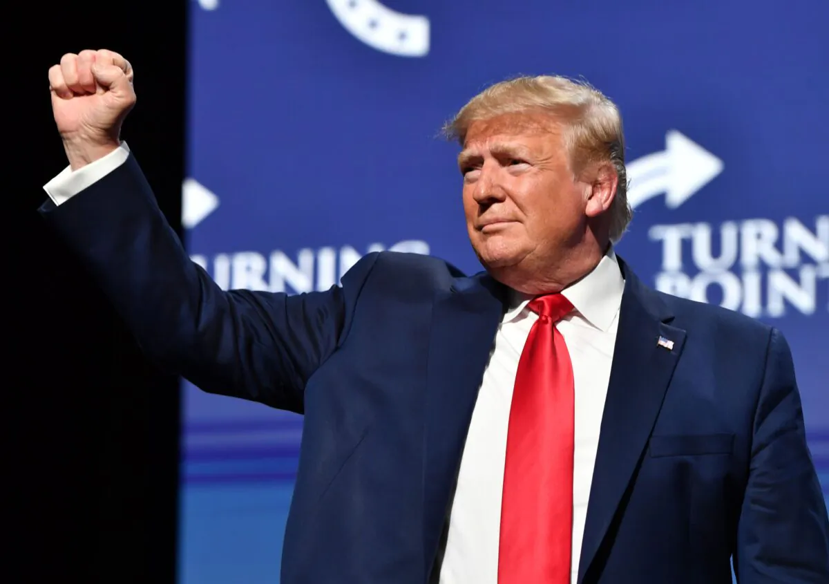 President Donald Trump gestures during the Turning Point USA Student Action Summit at the Palm Beach County Convention Center in West Palm Beach, Fla., on Dec. 21, 2019. (Nicholas Kamm/AFP via Getty Images)