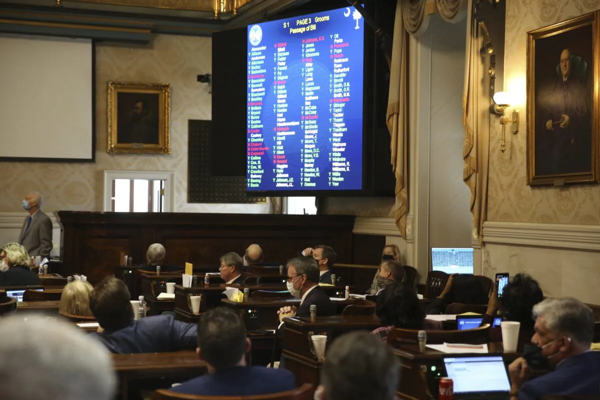 South Carolina Rep. David Hiott says a prayer as the House votes on a bill that would ban most abortions in the state, in Columbia, S.C., on Feb. 17, 2021. (Jeffrey Collins/AP Photo)