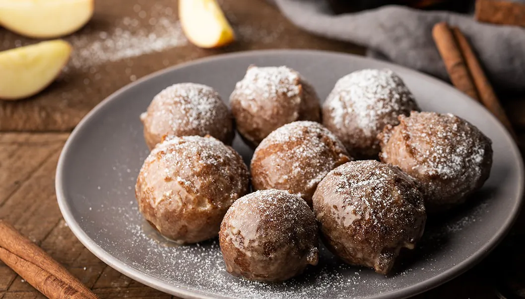With the help of hot oil, simple pantry staples are transformed into fluffy, spiced cake donuts worthy of a party. (Matt Genders Photography)