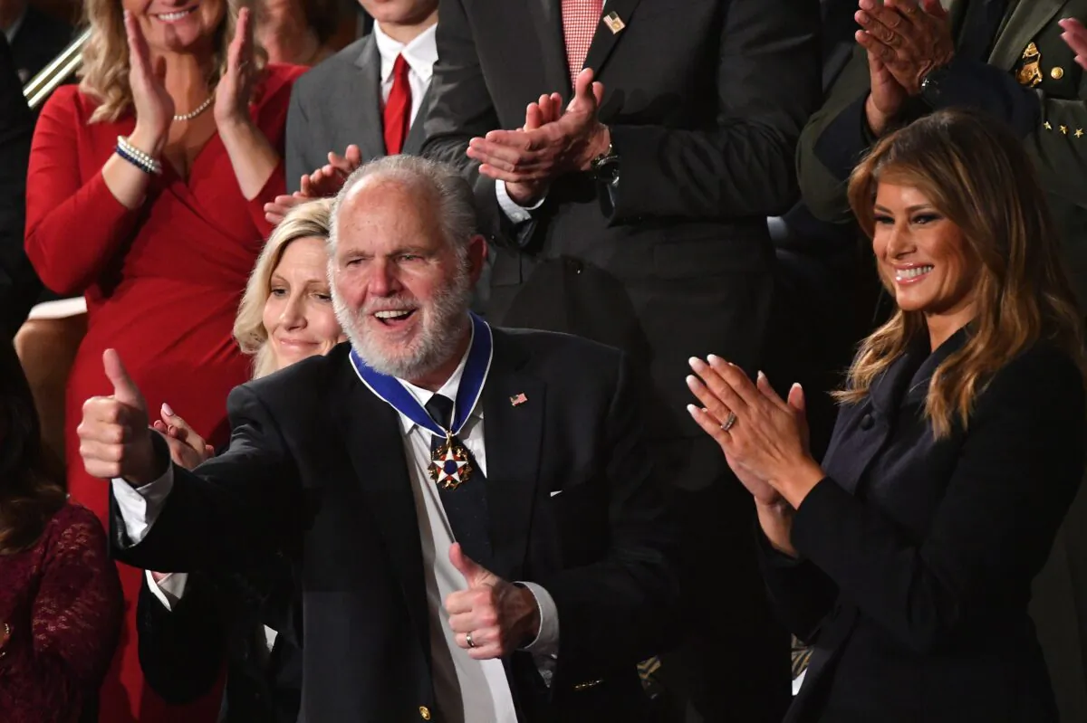 Radio personality Rush Limbaugh gives a thumbs-up after being awarded the Medal of Freedom by First Lady Melania Trump after being acknowledged by U.S. President Donald Trump as he delivers the State of the Union address at the Capitol in Washington on Feb. 4, 2020. (Mandel Ngan/AFP via Getty Images)