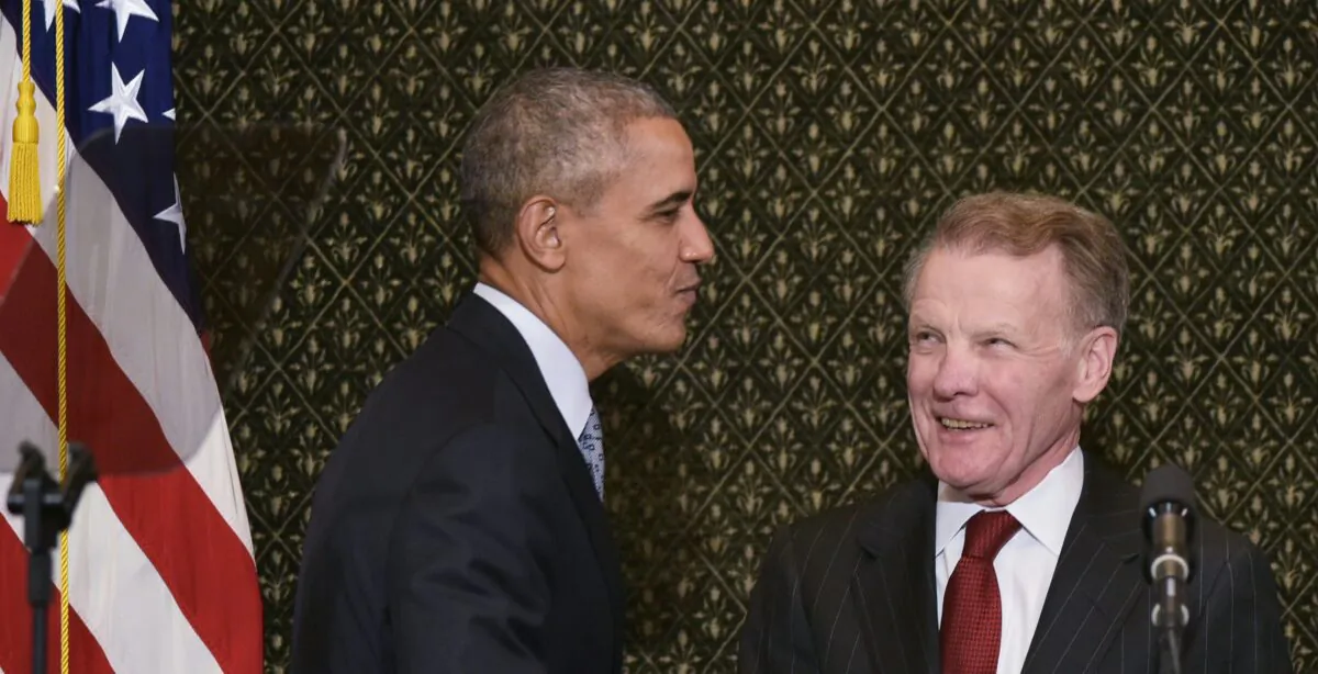 Then U.S. President Barack Obama shakes hands with then Illinois House Speaker Michael Madigan as he arrives to address the Illinois General Assembly at the Illinois State Capitol in Springfield, Ill. on Feb. 10, 2016. (Mandel Ngan/AFP via Getty Images)
