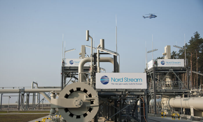 A helicopter flies over the terminal of the Nord Stream gas pipeline, the primary conduit of Russian gas to Europe, in Lubmin, Germany, on Nov. 8, 2011. (John MacDougall/AFP via Getty Images)