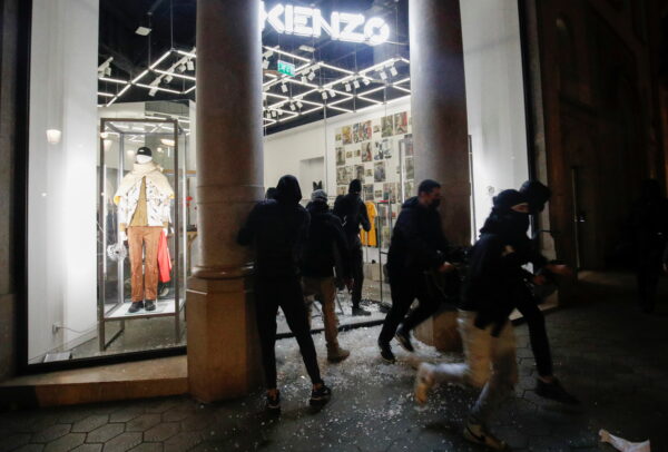 People leave after robbing a shop