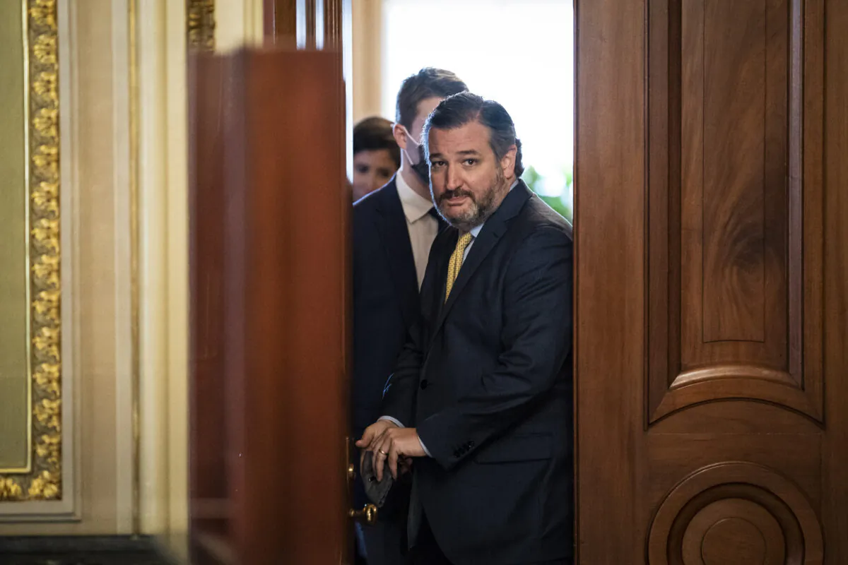 Sen. Ted Cruz (R-Texas) walks out of a meeting room for the lawyers of former President Donald Trump and back to the Senate floor through the Senate Reception room on the fourth day of the Senate Impeachment trials for former President Donald Trump on Capitol Hill in Washington on Feb. 12, 2021. (Jabin Botsford/Getty Images)
