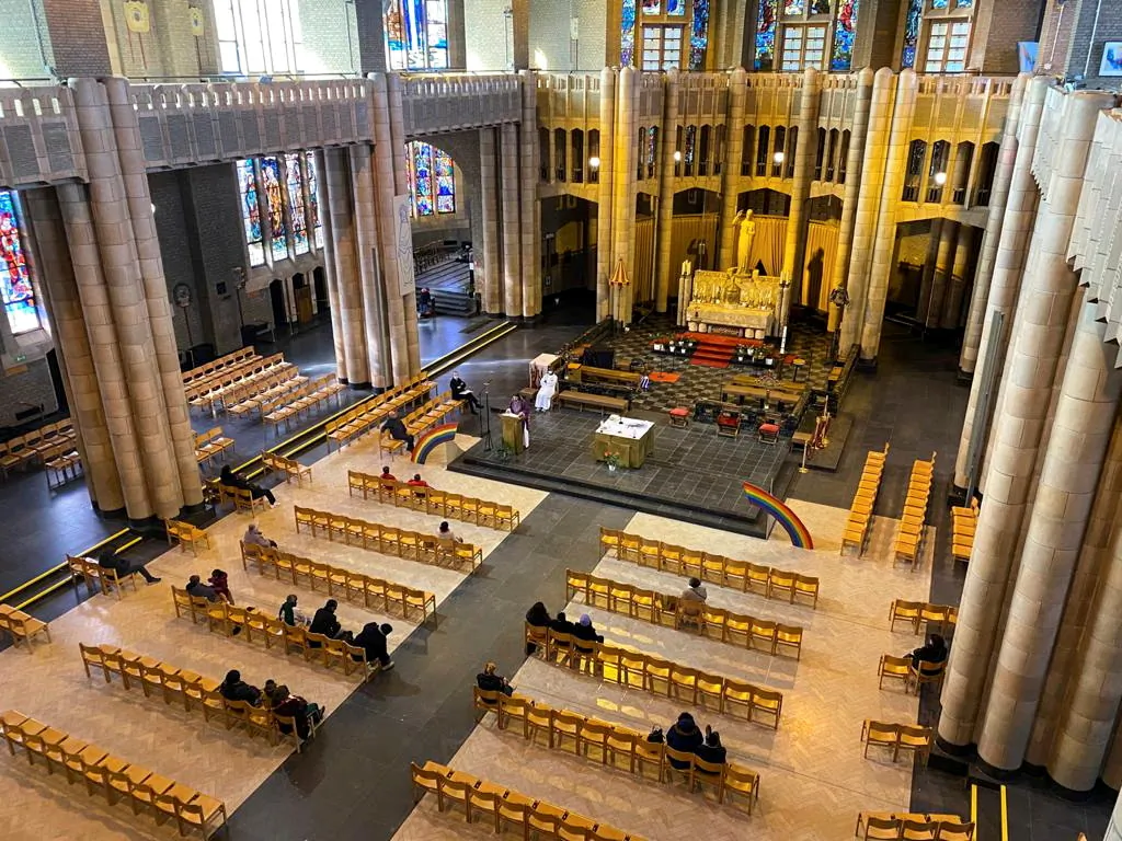 Parishioners, who can only gather in a group of maximum of 15 people at the same time in the building, attend a mass in Belgium's national Koekelberg basilica, one of the largest churches in the world, amid the coronavirus disease (COVID-19) outbreak in Brussels, on Feb. 21, 2021. (Johnny Cotton/Reuters)