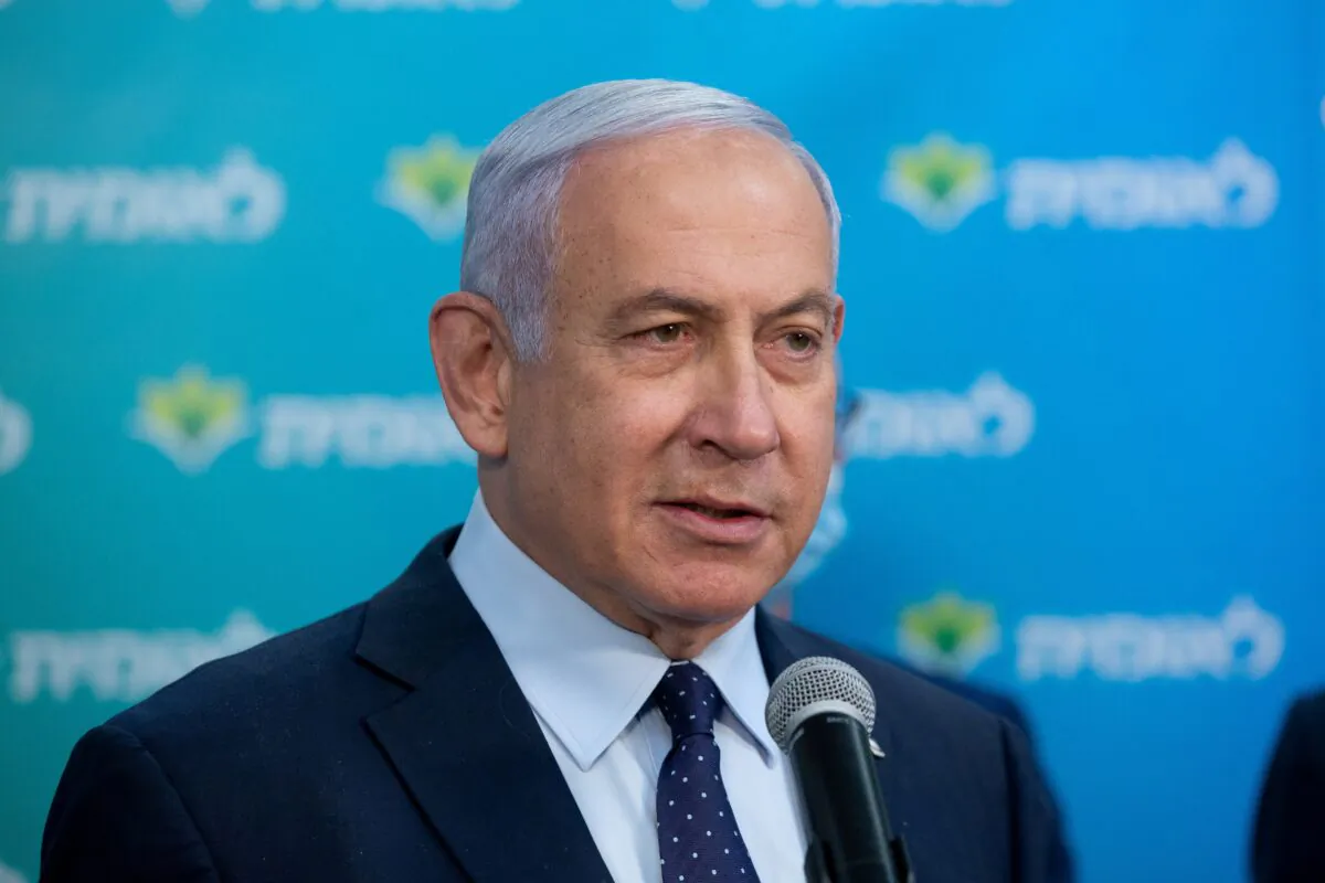 Israeli Prime Minister Benjamin Netanyahu speaks during a visit to Leumit Health Care Services vaccination facility in Jerusalem in Israel on Feb. 16, 2021. (Alex Kolomoisky/Pool via Reuters/File Photo)