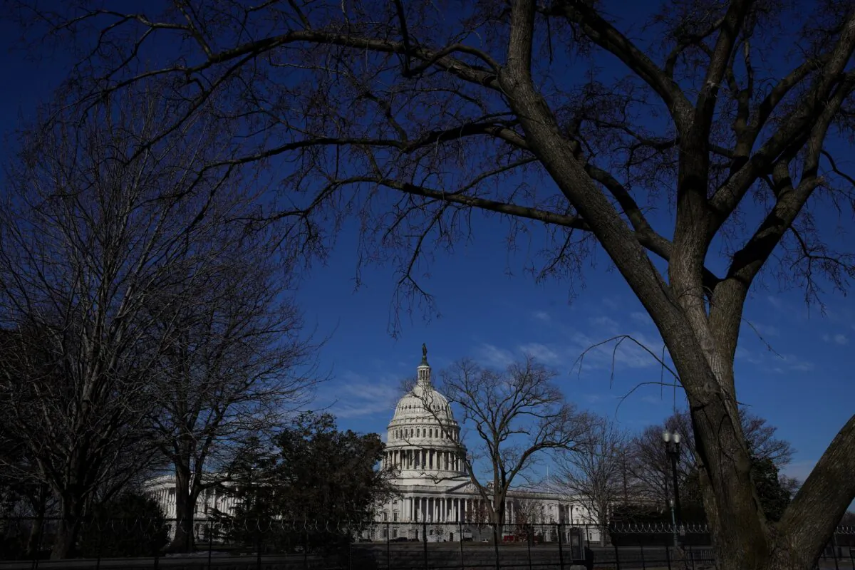 Barbed wire and security fencing surrounds the U.S. Capitol in Washington, on Feb. 5, 2021. (Sarah Silbiger/Reuters)