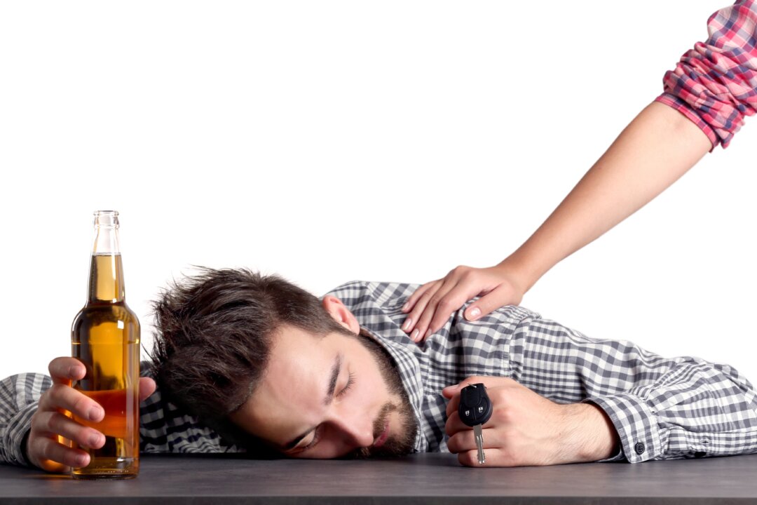 High levels of alcohol ingestion lead to a constellation of liver diseases.(Africa Studio/Shutterstock)
