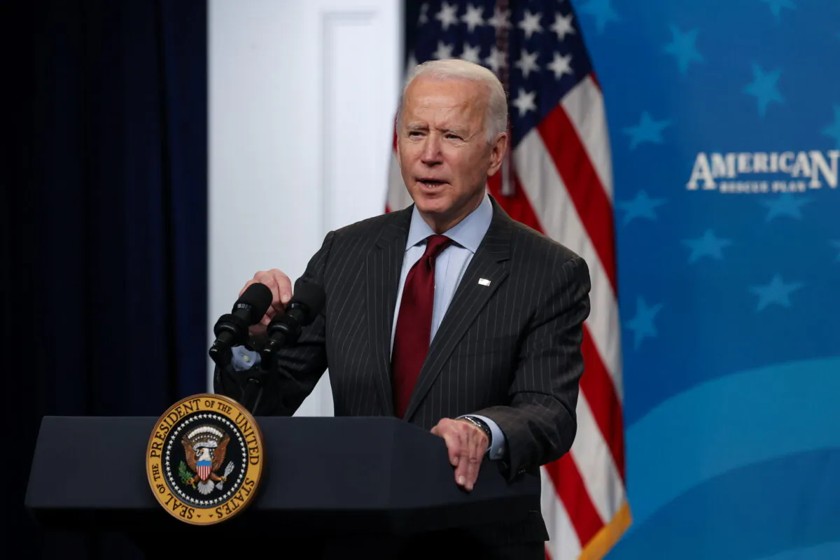 President Joe Biden announces changes to the Paycheck Protection Program for small businesses during brief remarks in the South Court Auditorium at the White House in Washington on Feb. 22, 2021. (Jonathan Ernst/Reuters)