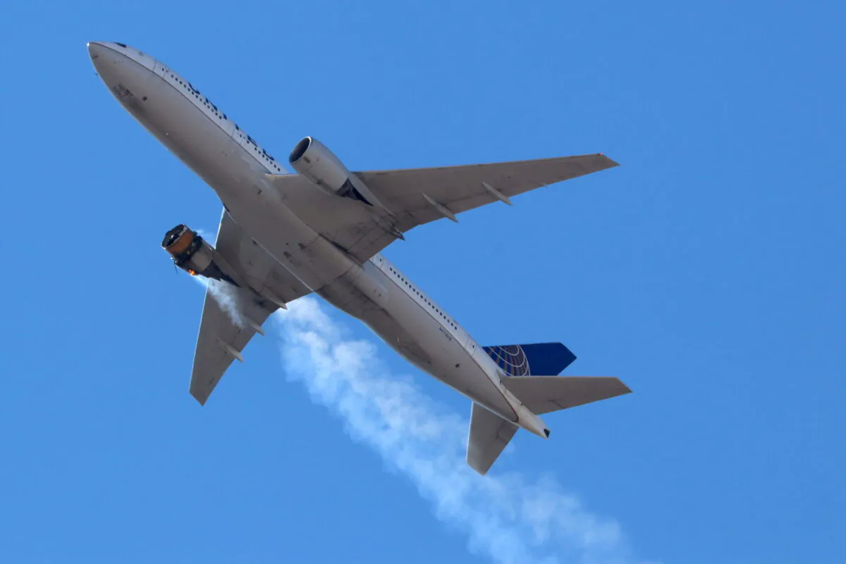 United Airlines flight UA328 returns to Denver International Airport with its starboard engine on fire after it called a Mayday alert, over Denver, Colo., on Feb. 20, 2021. (Hayden Smith/@speedbird5280 via Reuters)