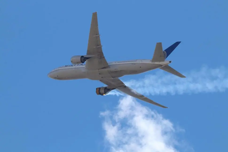 United Airlines Flight 328 approaches Denver International Airport, after experiencing "a right-engine failure" shortly after takeoff from Denver, Colo., on Feb. 20, 2021. (Hayden Smith via AP)