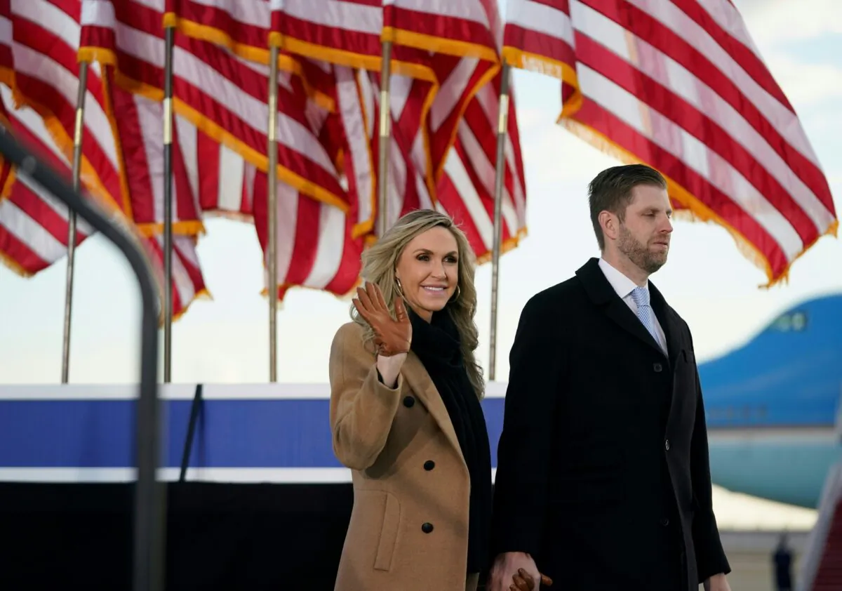 Eric Trump and his wife Lara arrive for outgoing U.S. President Donald Trump and First Lady Melania Trump's farewell at Joint Base Andrews in Maryland on Jan. 20, 2021. (Alex Edelman/AFP via Getty Images)