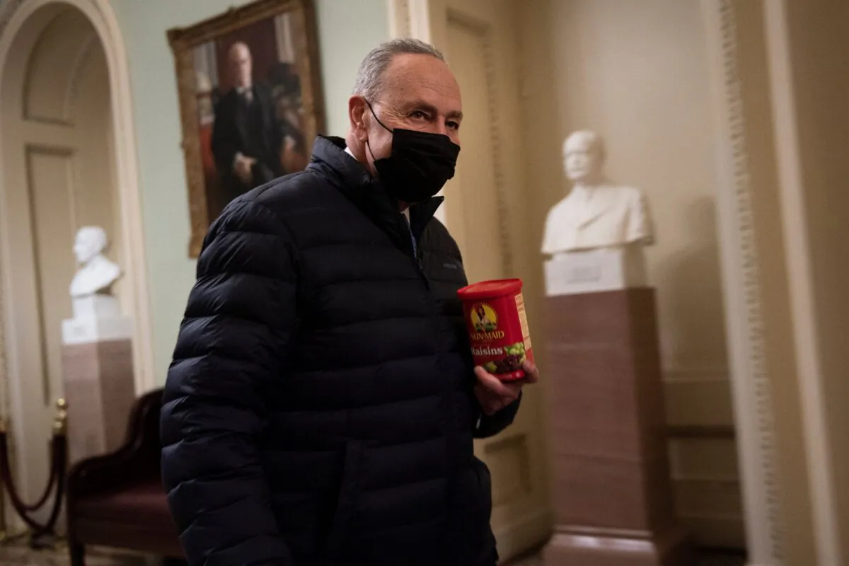 Senate Majority Leader Chuck Schumer (D-N.Y.) walks on Capitol Hill in Washington on Feb. 12, 2021. (Brendan Smialowski/AFP via Getty Images)