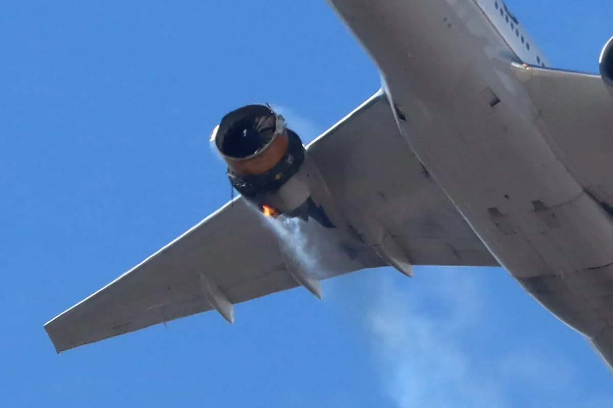 United Airlines flight UA328 returns to Denver International Airport with its starboard engine on fire after it called a Mayday alert, over Denver, Colo., on Feb. 20, 2021. (Hayden Smith/@speedbird5280/Handout via Reuters)