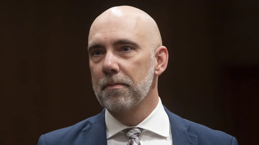 Parliamentary Budget Officer Yves Giroux waits to appear before the Commons Finance committee on Parliament Hill in Ottawa on March 10, 2020. (The Canadian Press/Adrian Wyld)