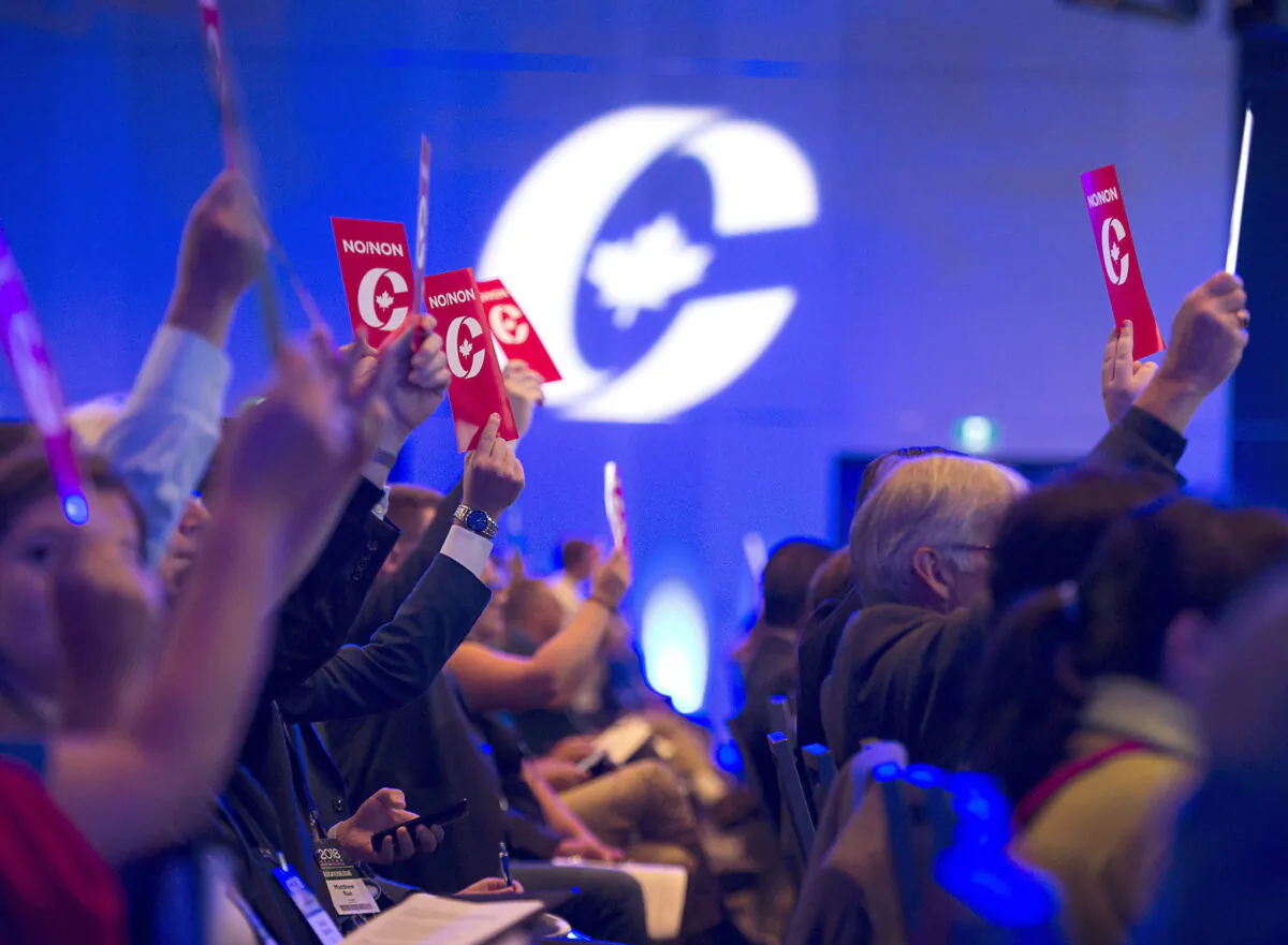 Delegates vote on party constitution items at the Conservative Party of Canada national policy convention in Halifax on Friday, Aug. 24, 2018. (The Canadian Press/Andrew Vaughan)