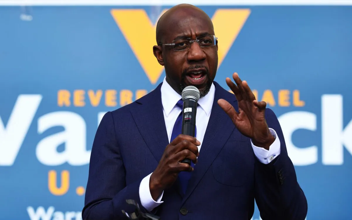 Then Georgia Democratic candidate Rev. Raphael Warnock speaks at his Labor Canvass Launch at IBEW Local 613 in Marietta, Ga., on Jan. 5, 2021. (Michael M. Santiago/Getty Images)