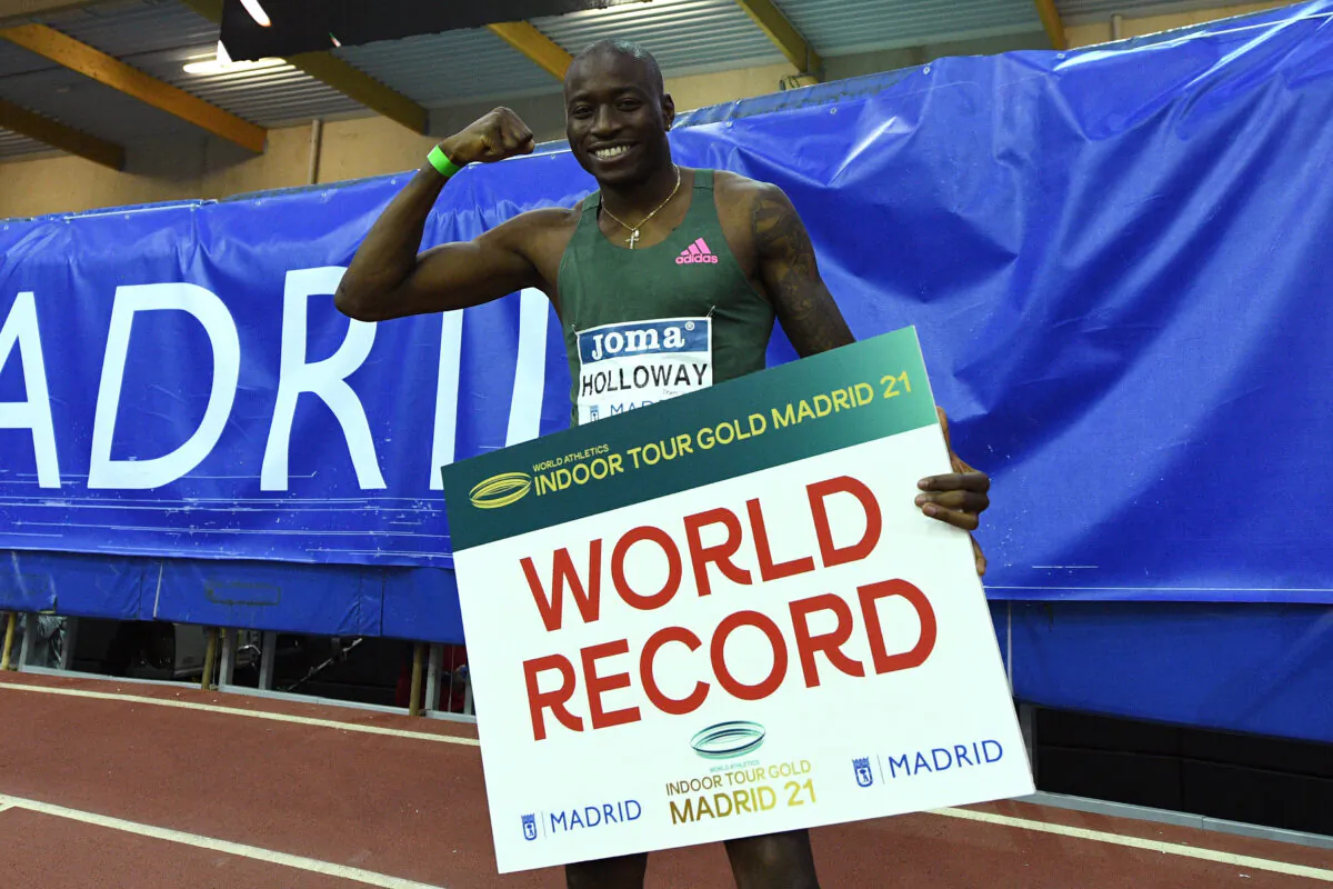 Grant Holloway of the United States celebrates a world record time in the Men's 60 meters Hurdles final during the World Athletics Indoor Tour 2021 in Madrid, Spain, on Feb. 24, 2021. (David Ramos/Getty Images)