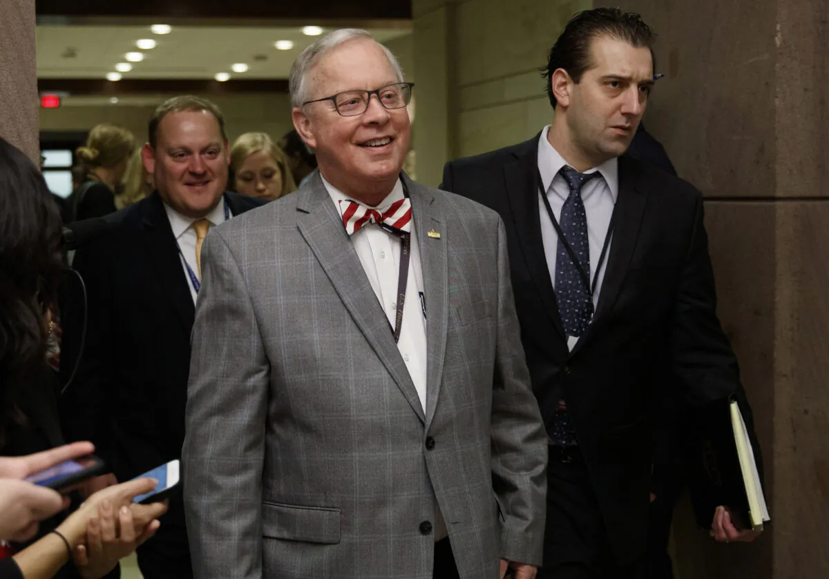 File photo showing the late Rep. Ron Wright (R-Texas) walking to a session on Capitol Hill, in Washington, on Nov. 15, 2018. (Carolyn Kaster, File/AP Photo)