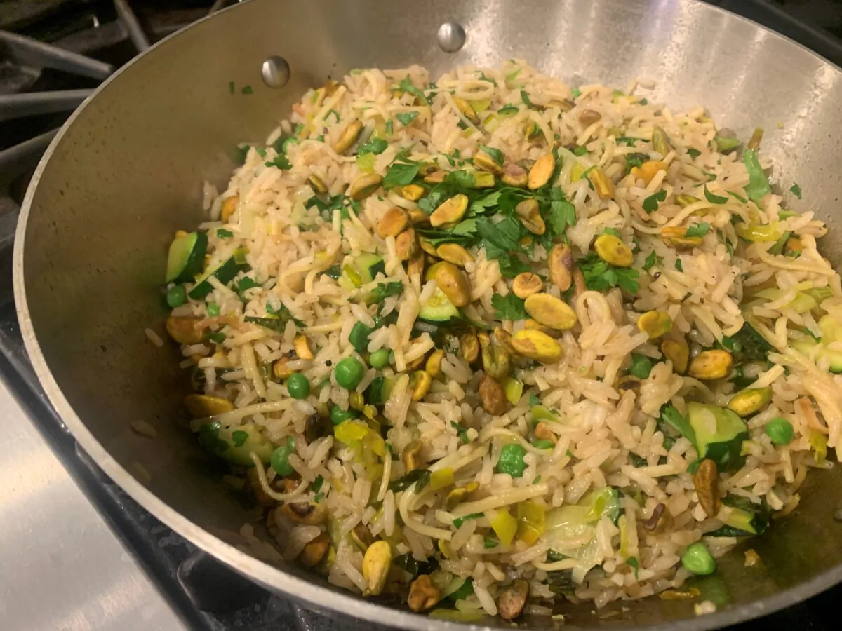 This two-in-one side dish is perfect for St Patrick’s Day, with lots of green peeking through the rice and noodles. (Diane Rossen Worthington/TNS)