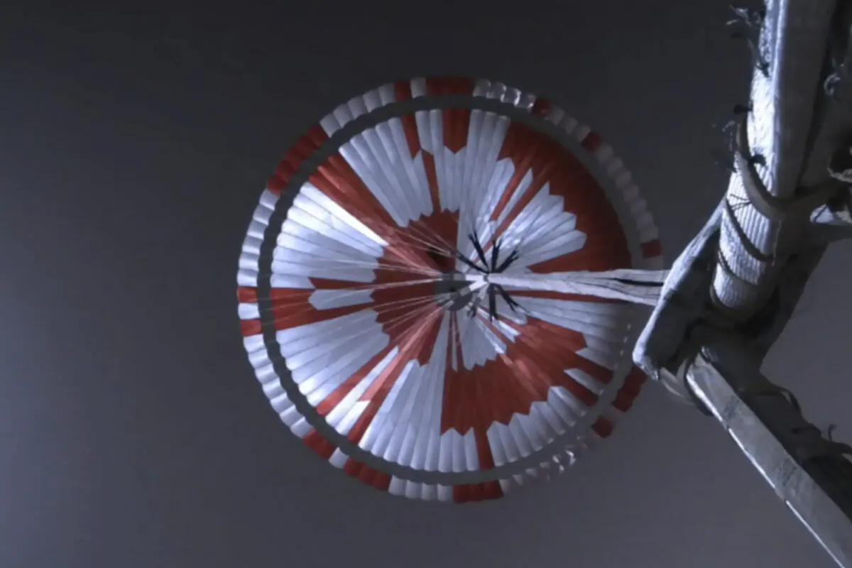 This image from video made available by NASA shows the parachute deployed during the descent of the Mars Perseverance rover as it approaches the surface of the planet, on Feb. 18, 2021. (NASA/JPL-Caltech via AP)