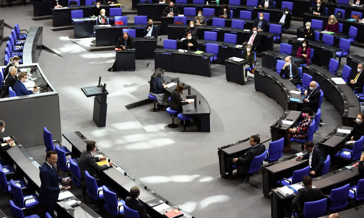 German Health Minister Jens Spahn answers questions on the spread of the coronavirus disease (COVID-19) during a plenum session at the lower house of parliament, the Bundestag, in Berlin, Germany, on Feb. 24, 2021. (Annegret Hilse/Reuters)