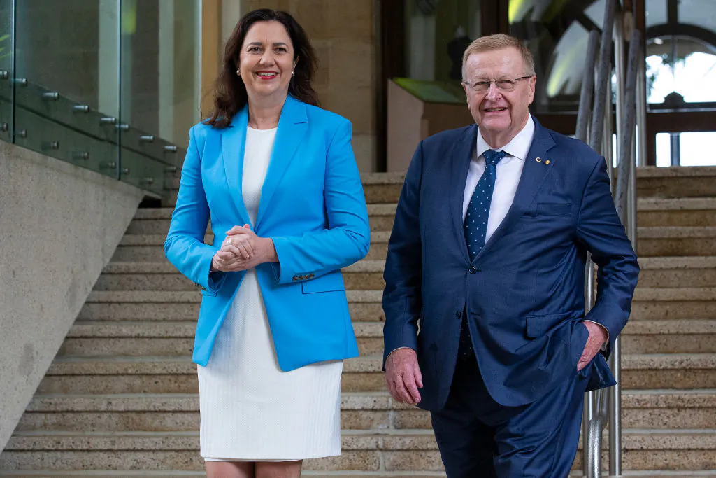Qld Premier Annastacia Palaszczuk and President of the Australian Olympic Committee John Coates arrive to speak to the media during a press conference after the IOC announced targeted dialogue ahead of the 2032 Brisbane Olympic Games bid, at Queensland Parliament House on February 25, 2021 in Brisbane, Australia. (Jono Searle/Getty Images)