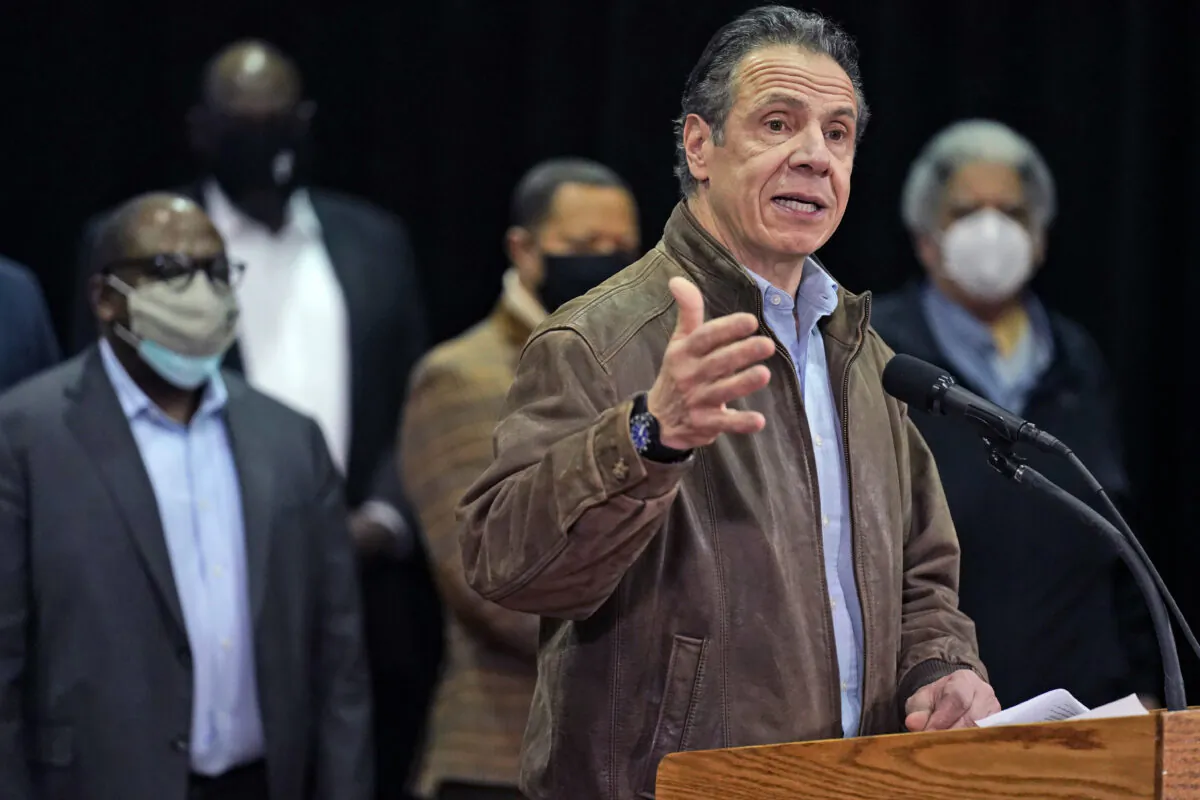 New York Gov. Andrew Cuomo speaks during a press conference before the opening of a mass COVID-19 vaccination site in the Queens borough of New York, N.Y., on Feb. 24, 2021. (Seth Wenig/POOL/AFP via Getty Images)